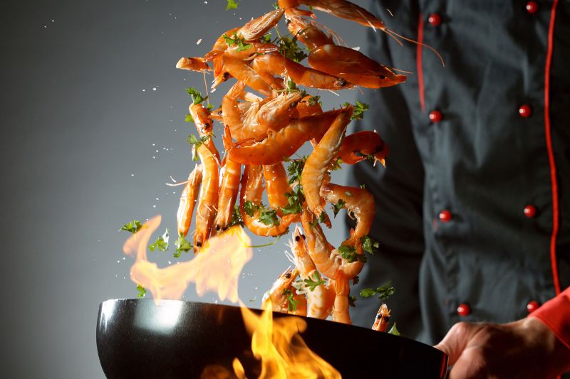 Cuisine Maîtrisez l'Art de la Cuisine au Wok : Secrets pour des Plats Explosifs de Saveurs