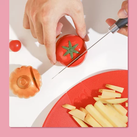 Aiguiseur couteau design tête d'ail et tomate en corindon blanc